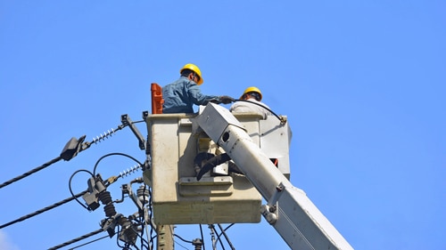 Electric men working